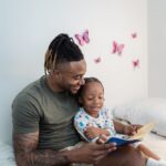 Father Reading Bedtime Story to Daughter