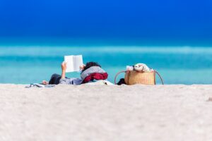 person lying on shore