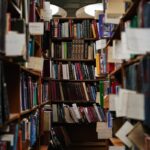 books on brown wooden shelf