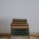 pile of Bible on brown surface